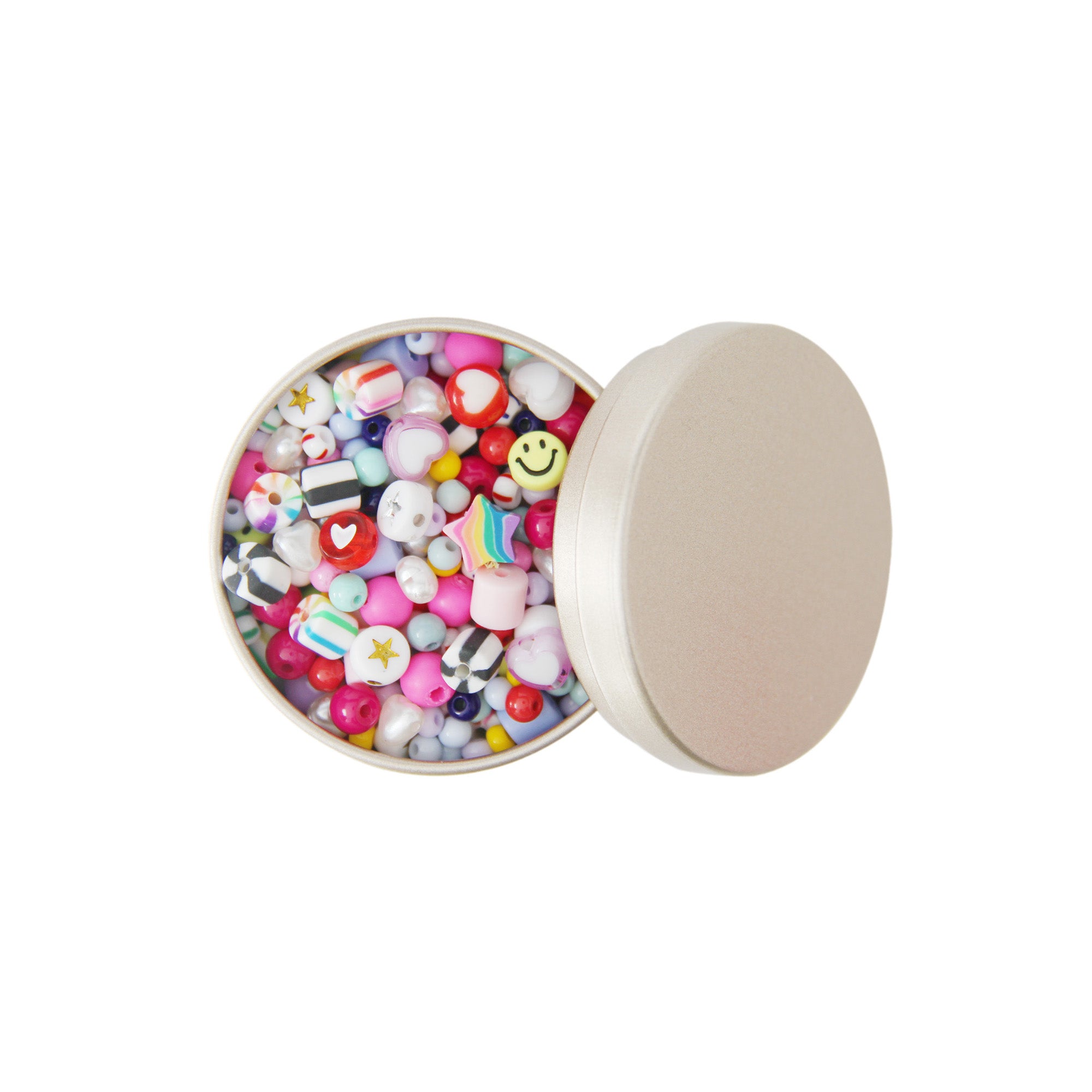 Gold round tin filled with a mix of colorful beads and a smiley face bead on a white background