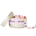 Gold tin containing a mix of rainbow  beads on a white background, featuring 'House of Beads' branding.