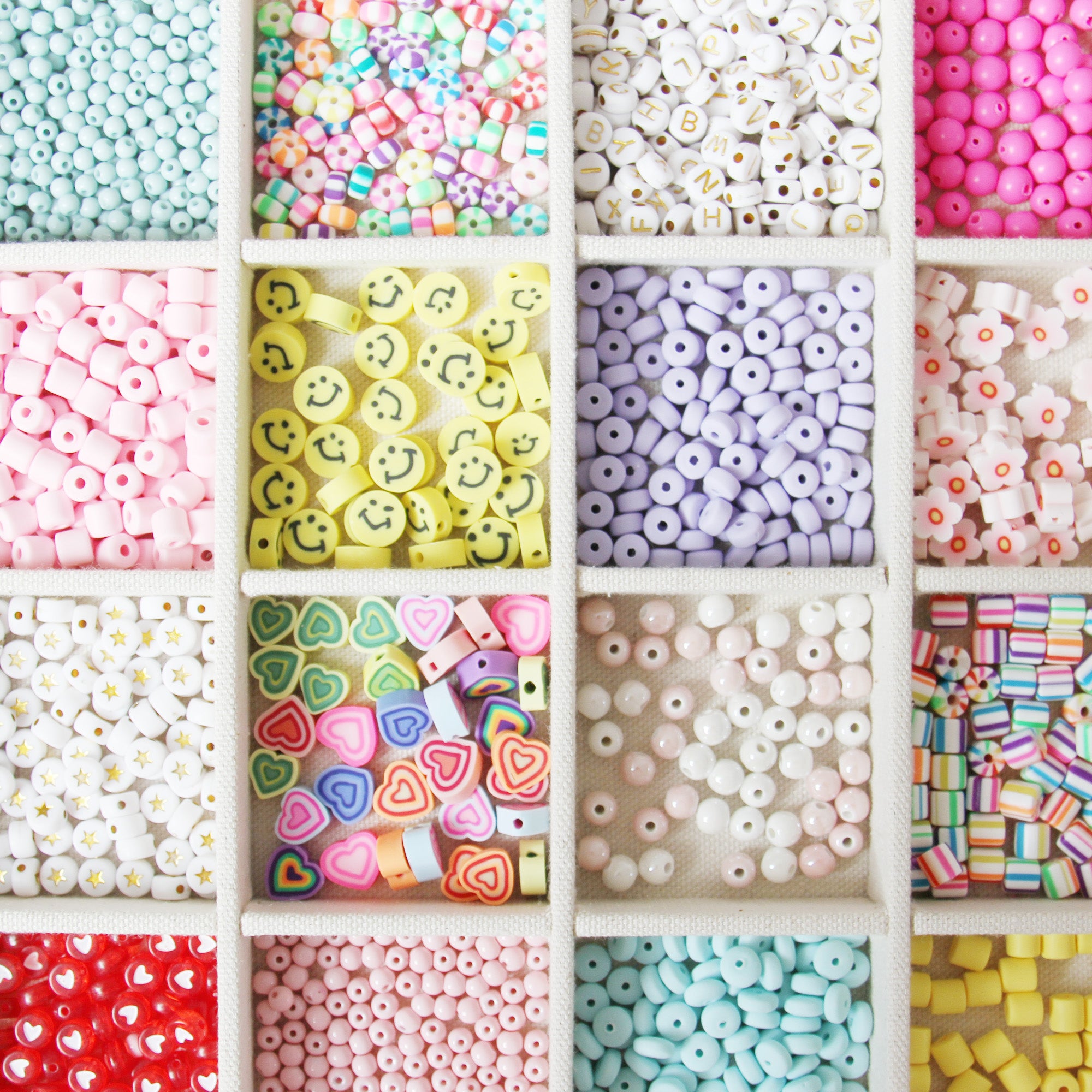 Tray of colourful pick and mix beads