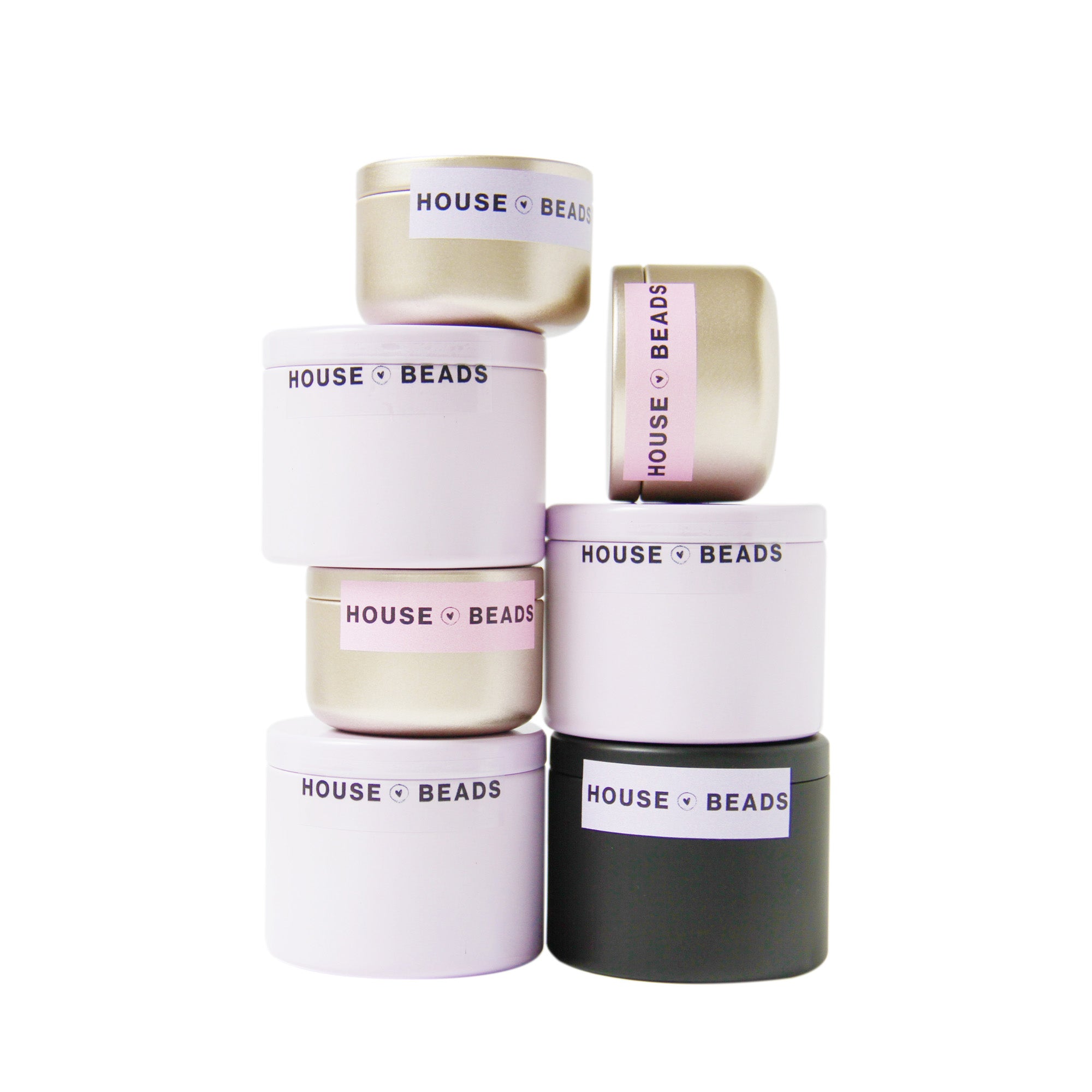 Stack of House of Bead bead kits on a white background