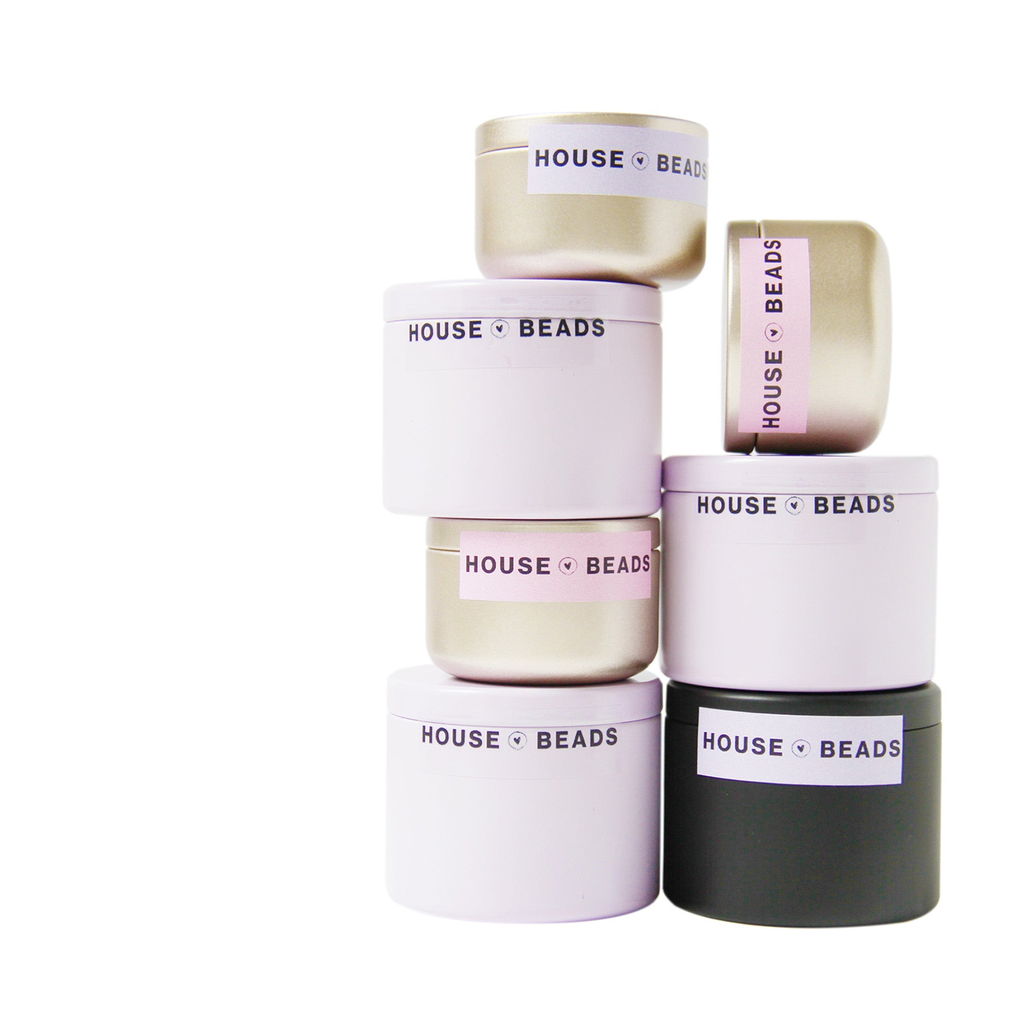 Stack of House of Bead bead kits, on a white background